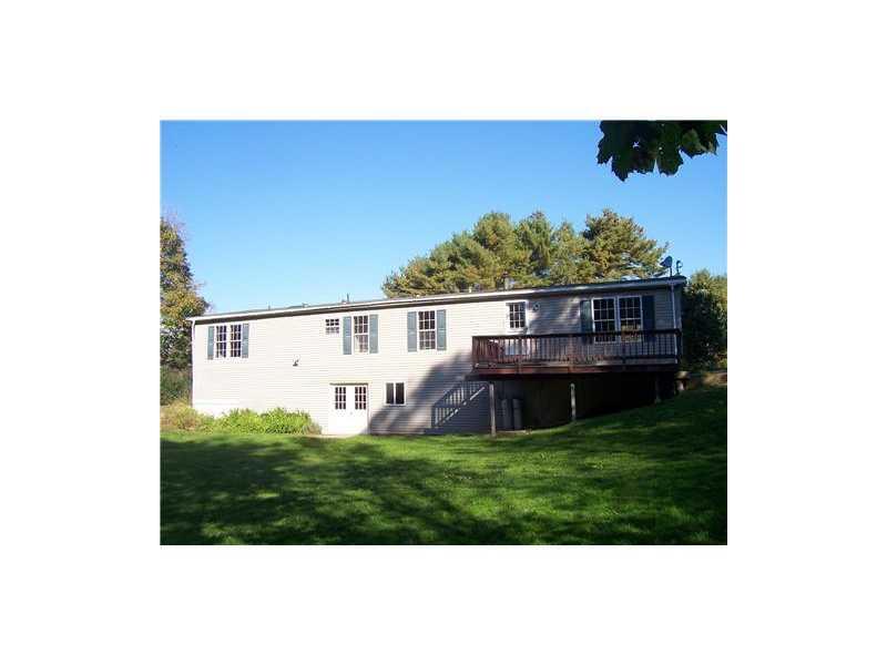 48 Clement Point Road Warren, ME 04864 - Photo 1 of 11 Exterior Back. Back deck and...