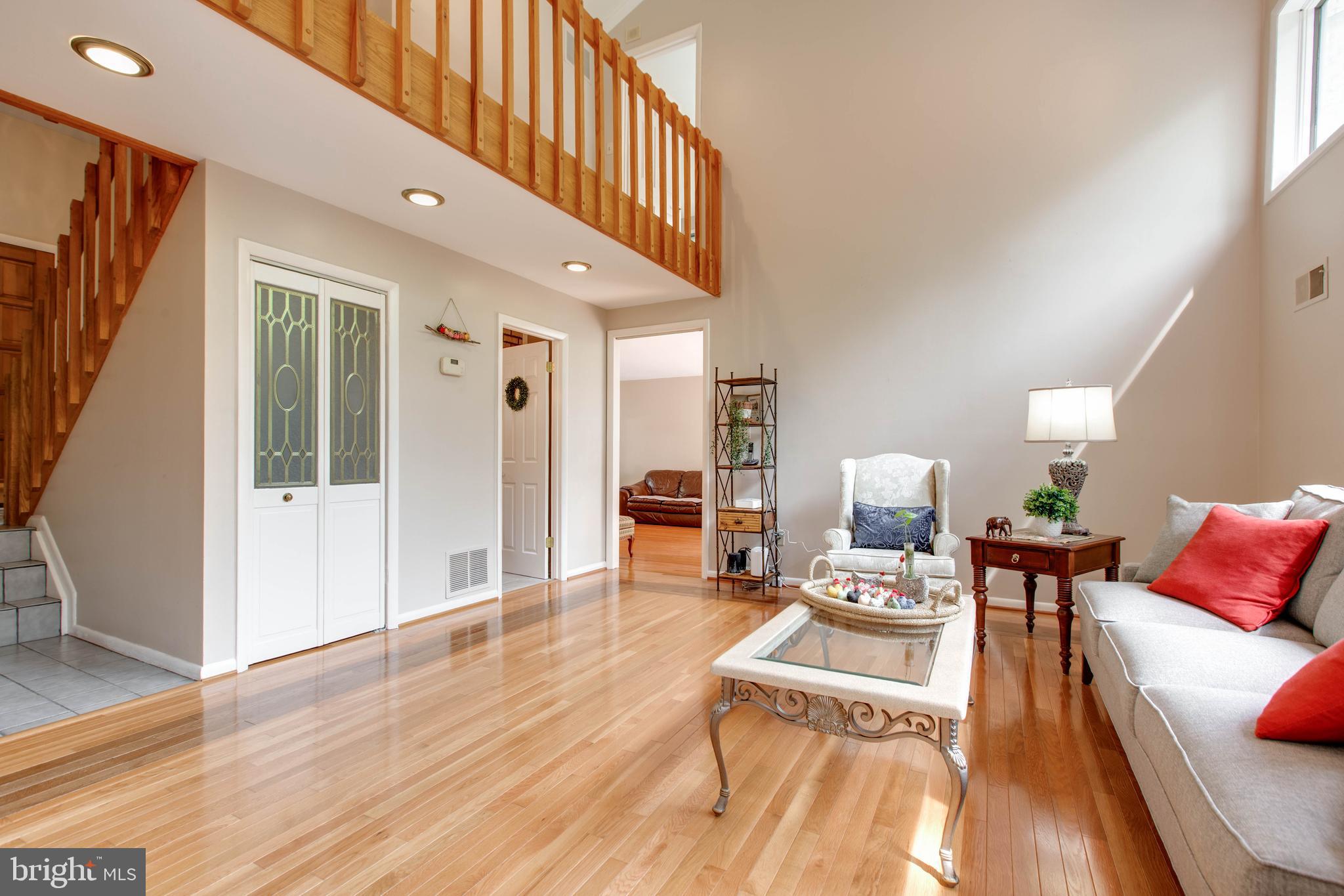5519 Woodbine Road Sykesville, MD 21784 - Photo 12 of 69 a living room with furniture and a wooden floor