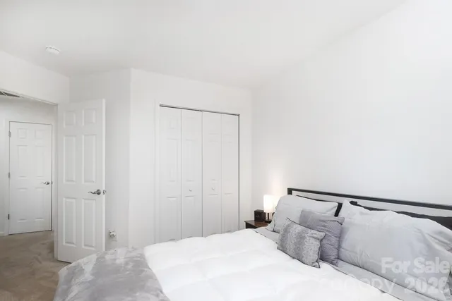 a bathroom with a sink mirror and vanity