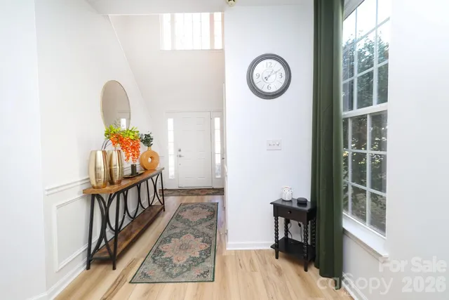 a view of entryway with wooden floor
