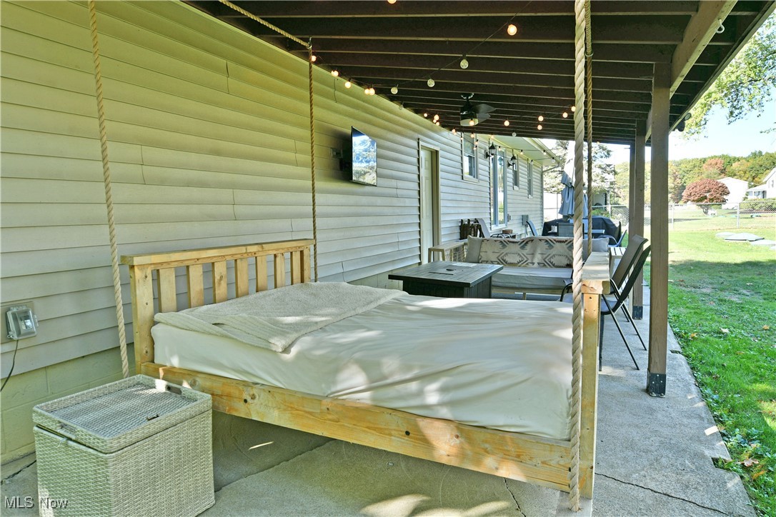 4400 Ridge Road Cortland, OH 44410 - Photo 46 of 50 View of patio with a ceiling fan and a deck