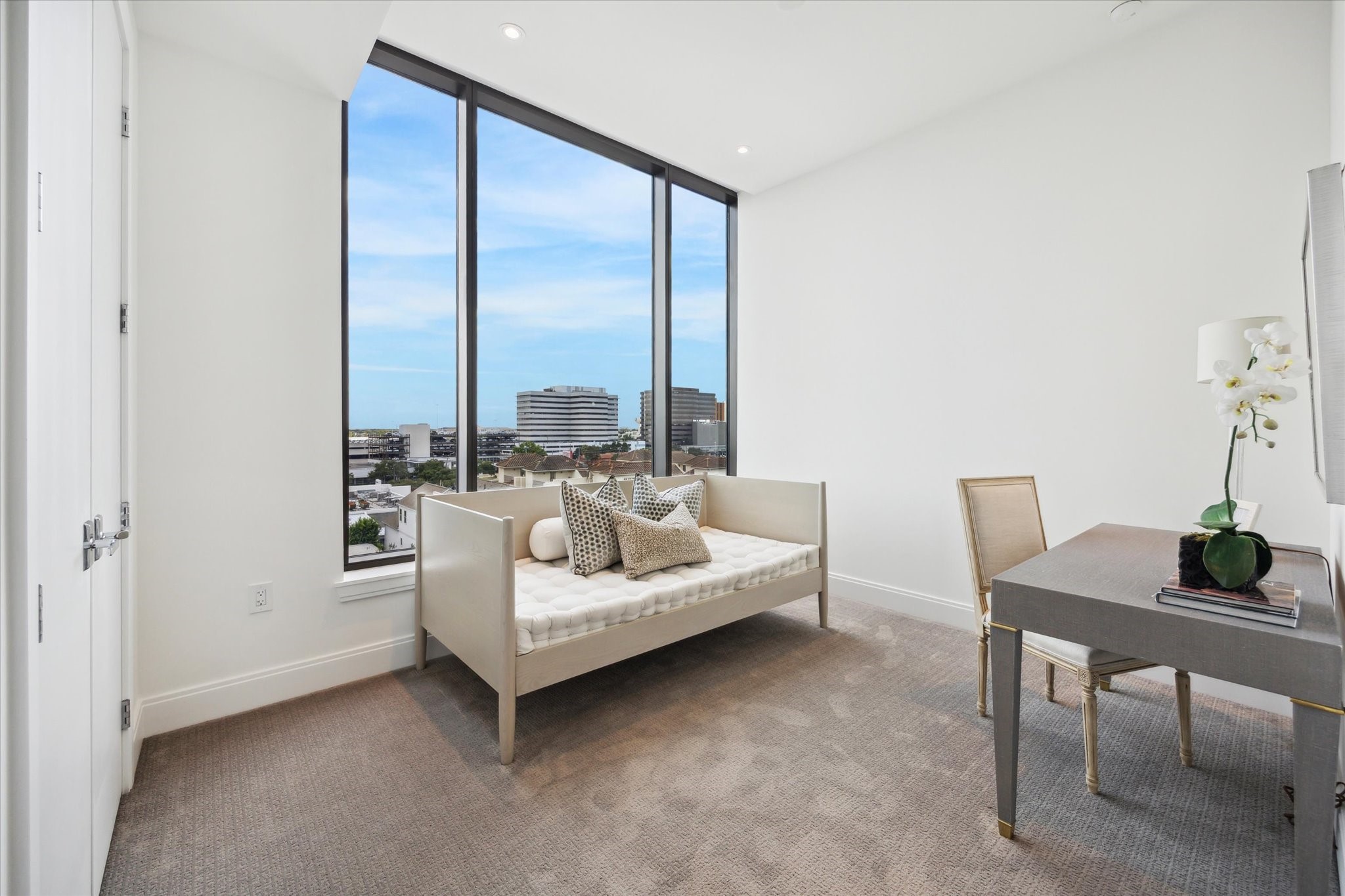 2323 West Main Street, Unit 603 Houston, TX 77098 - Photo 13 of 18 a living room with furniture and a large window