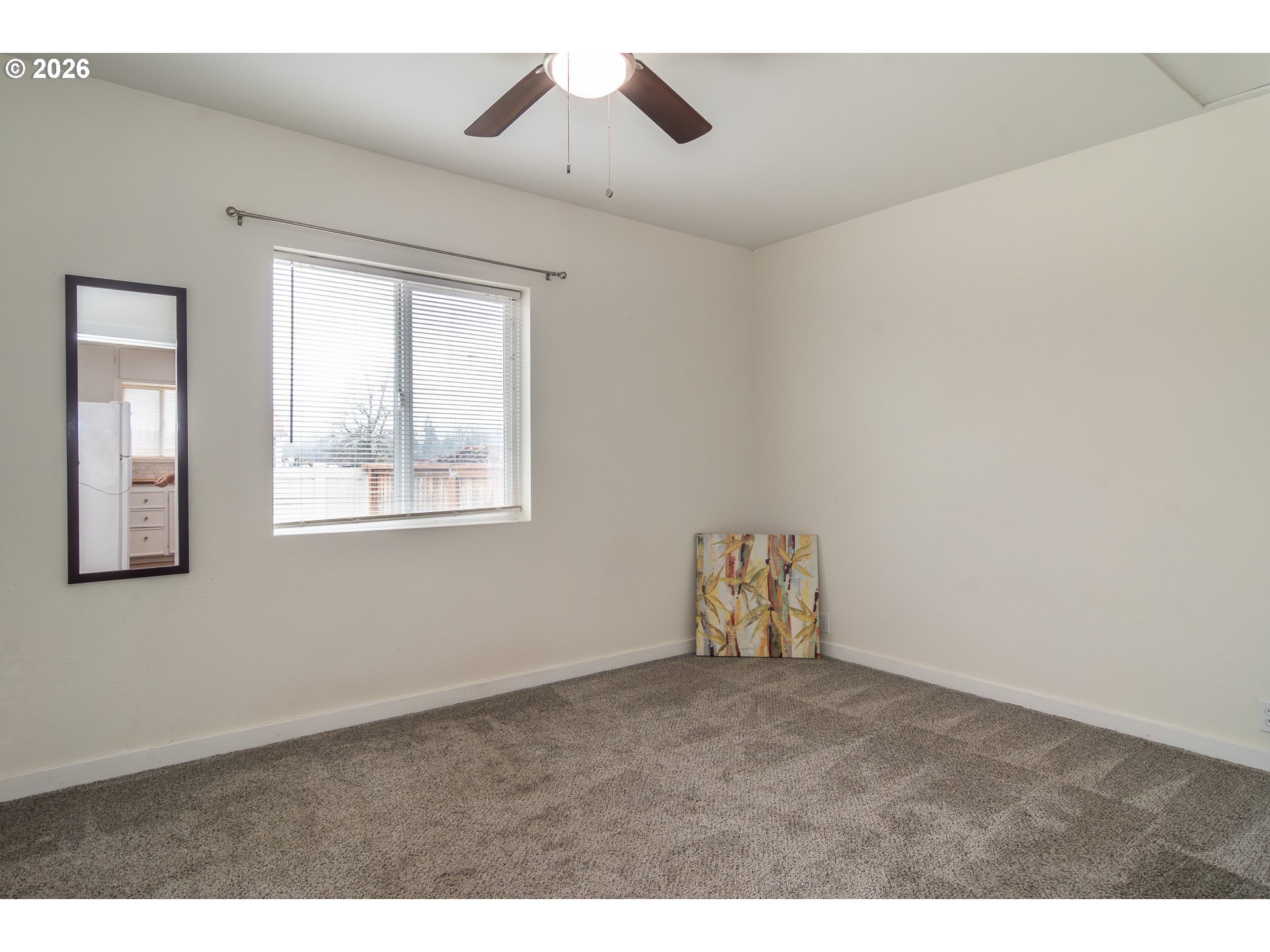 139 South R Street Riddle, OR 97469 - Photo 17 of 33 a view of an empty room with a window