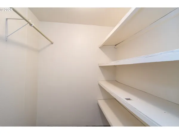 a view of small space with racks on the wall