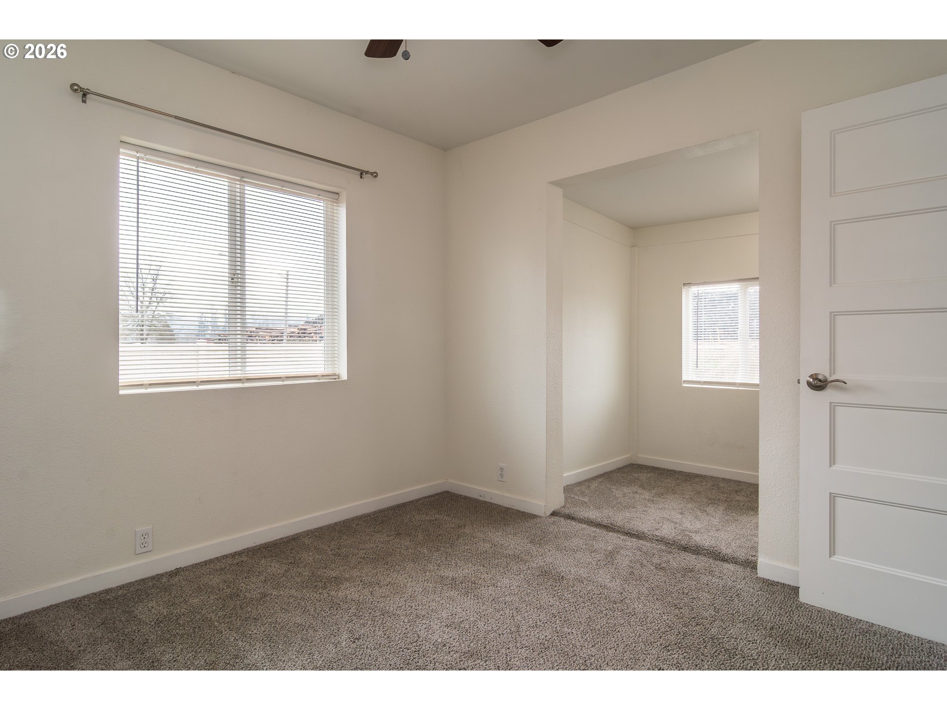 139 South R Street Riddle, OR 97469 - Photo 21 of 33 a view of an empty room with a window