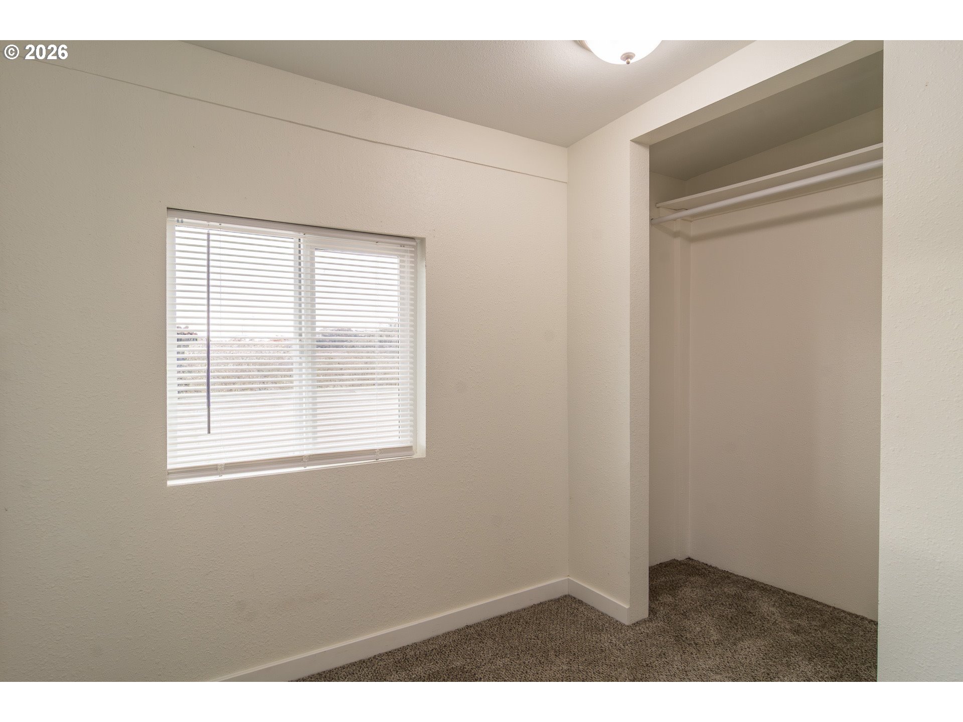 139 South R Street Riddle, OR 97469 - Photo 22 of 33 a view of an empty room with a window