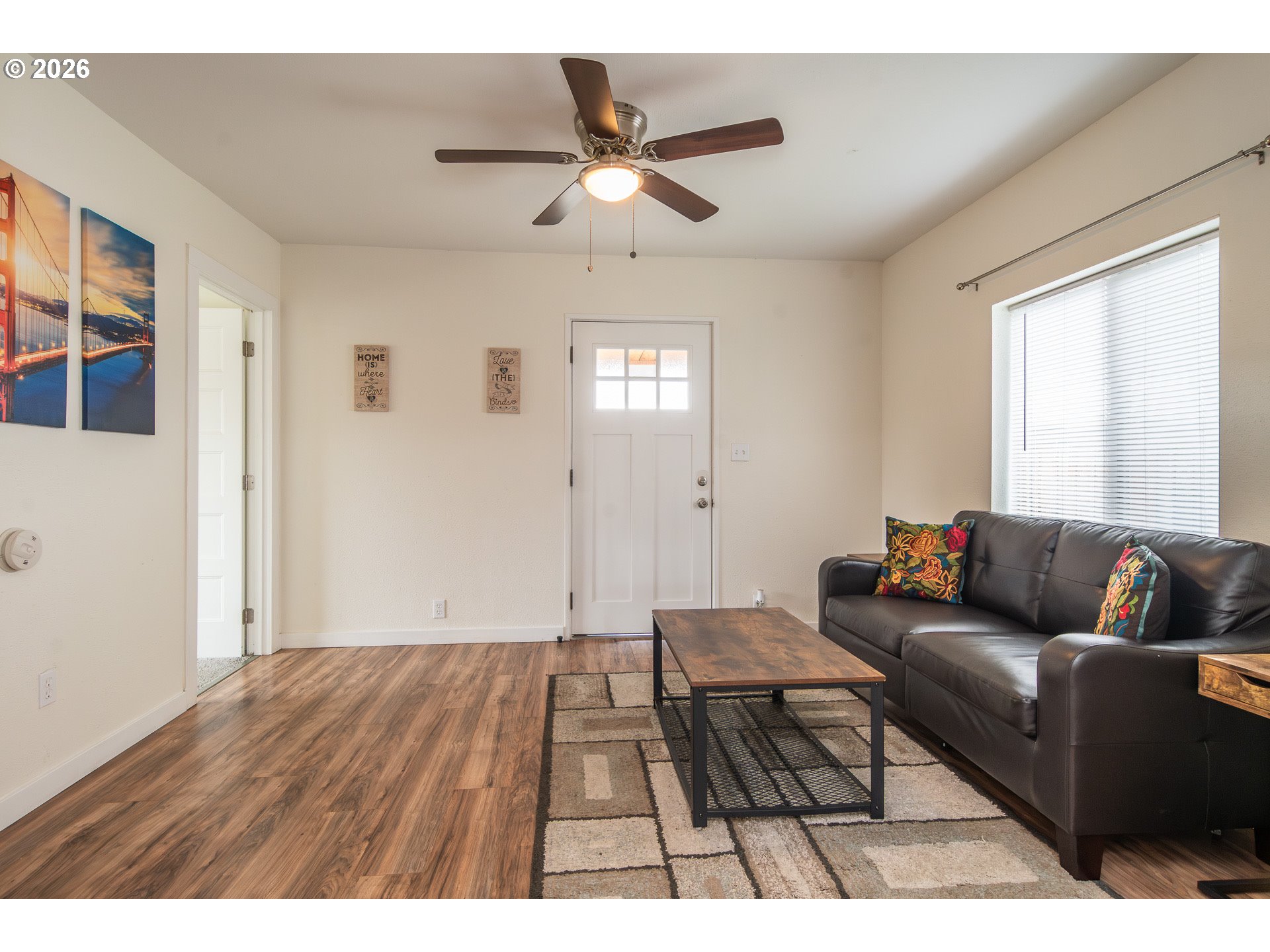 139 South R Street Riddle, OR 97469 - Photo 7 of 33 a living room with furniture and a ceiling fan