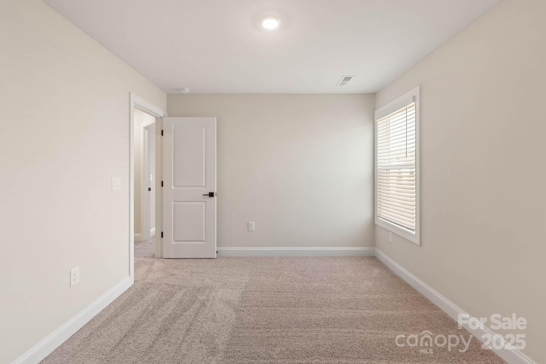 109 Rills Xing Way Troutman, NC 28166 - Photo 18 of 19 a view of room and window