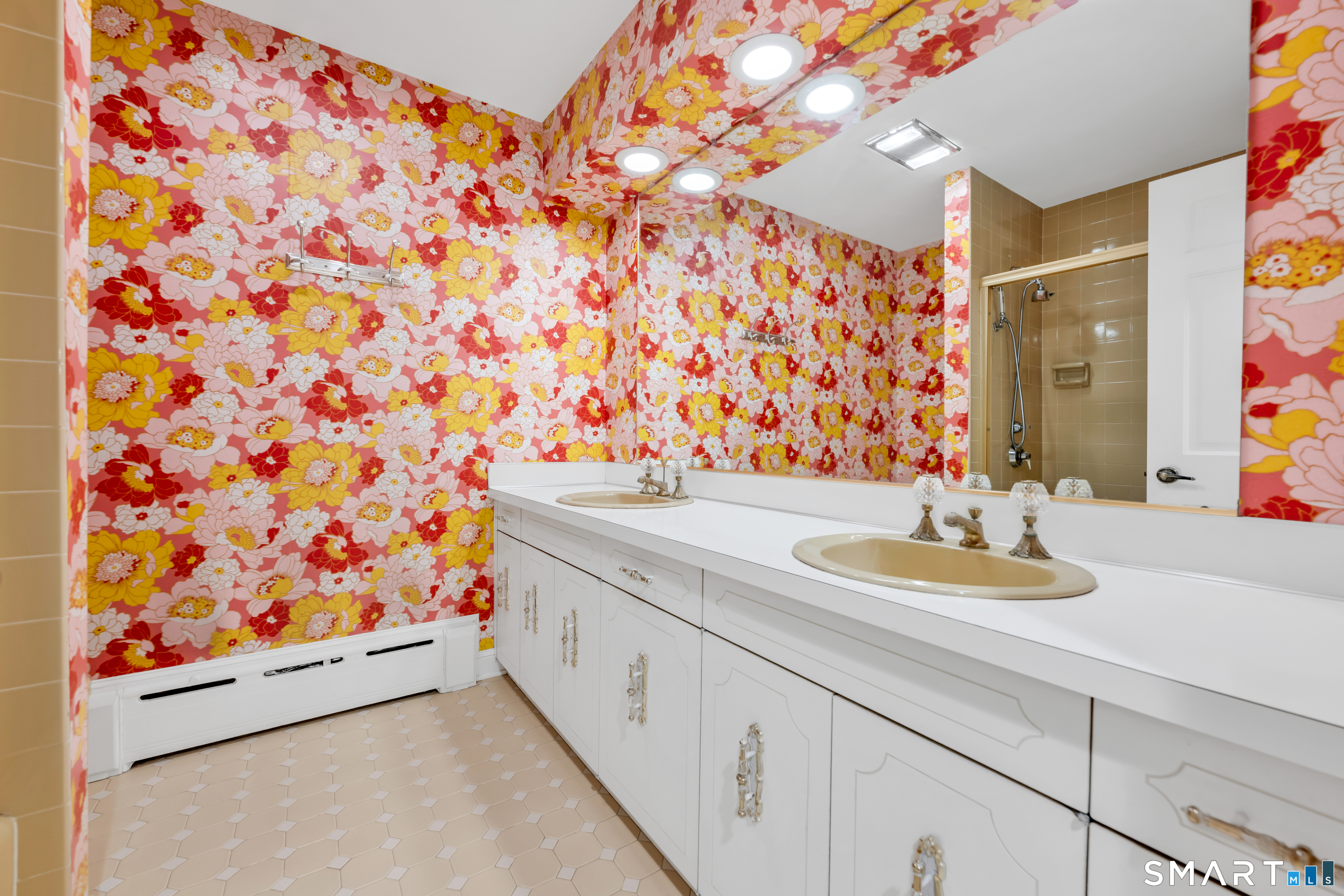 232 Maybrook Road Waterbury, CT 06708 - Photo 30 of 38 a bathroom with a sink and a mirror