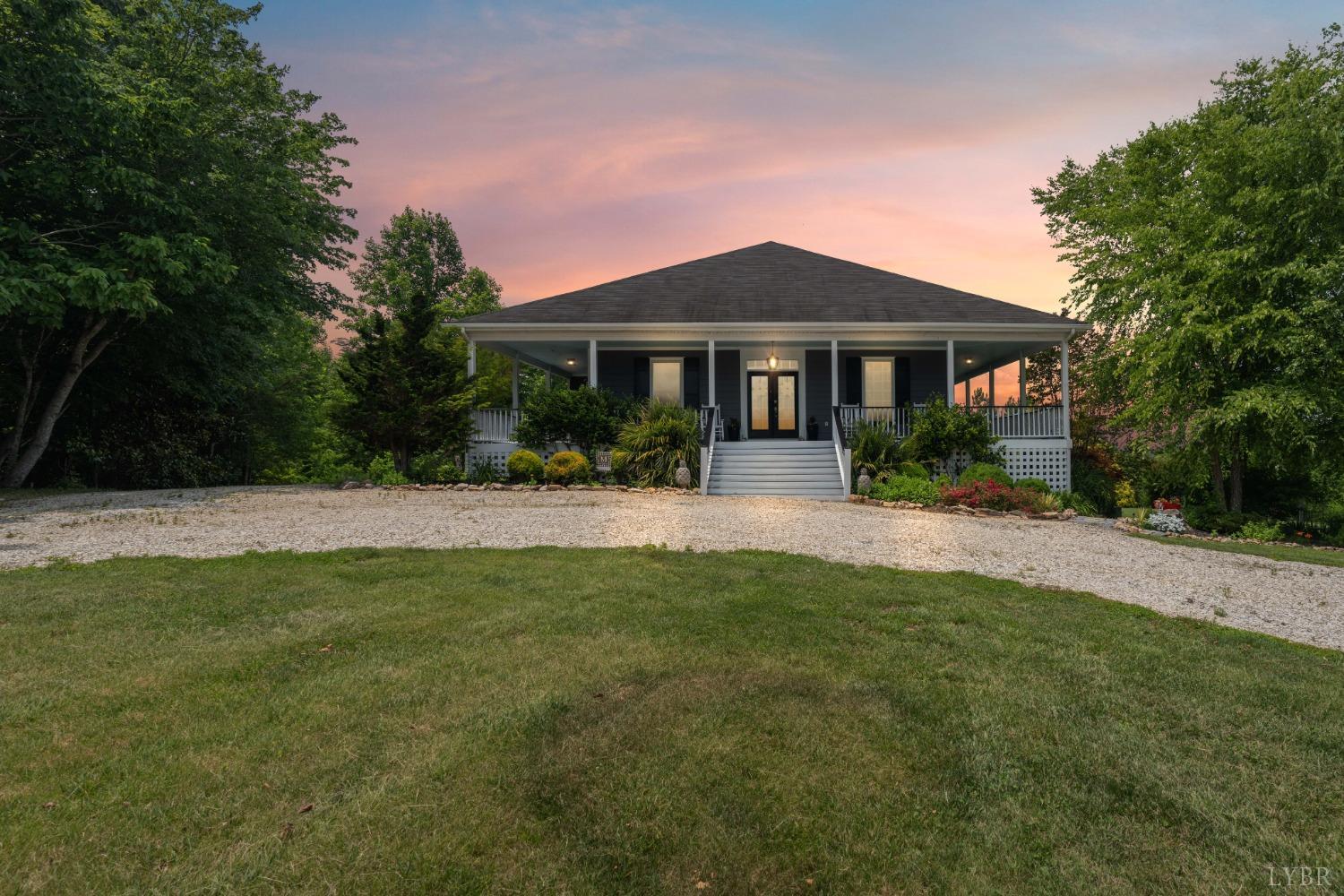 3297 Midway Road Phenix, VA 23959 - Photo 1 of 89 a front view of a house with a yard