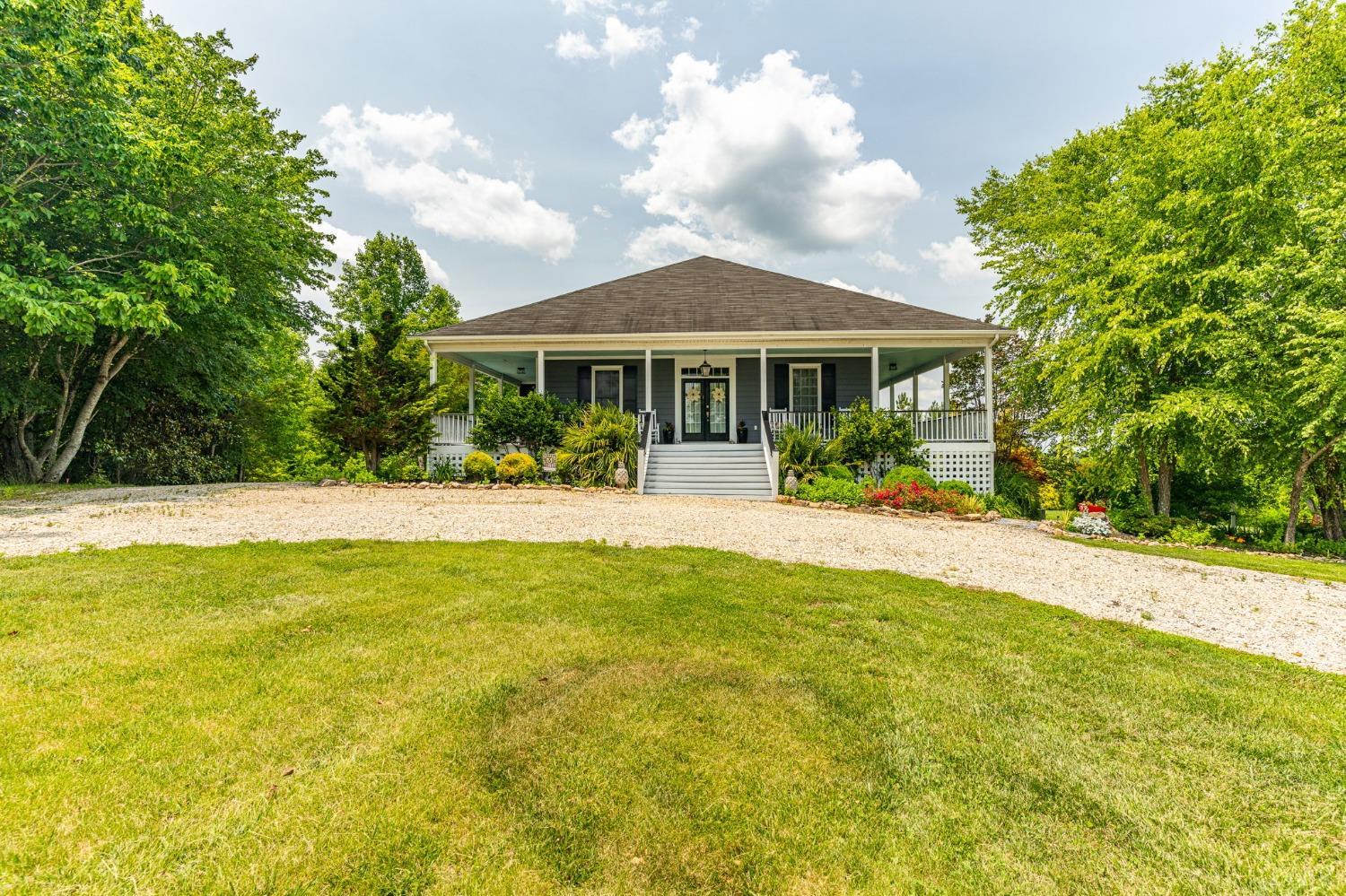 3297 Midway Road Phenix, VA 23959 - Photo 12 of 89 a front view of house with yard and trees around