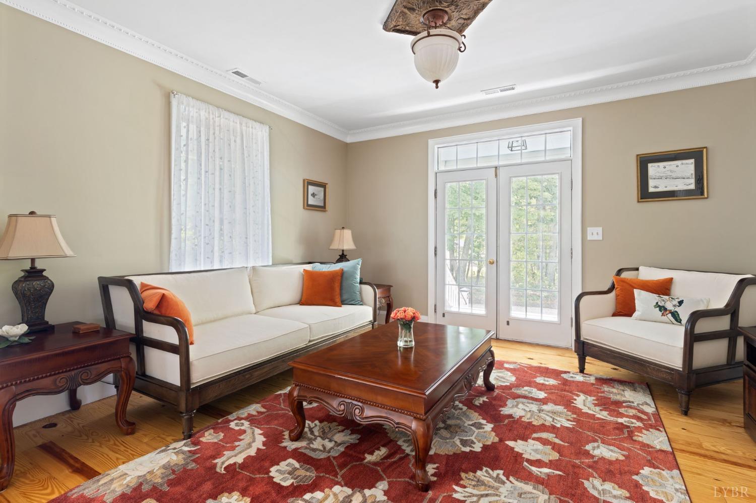 3297 Midway Road Phenix, VA 23959 - Photo 26 of 89 a living room with furniture a rug and a window