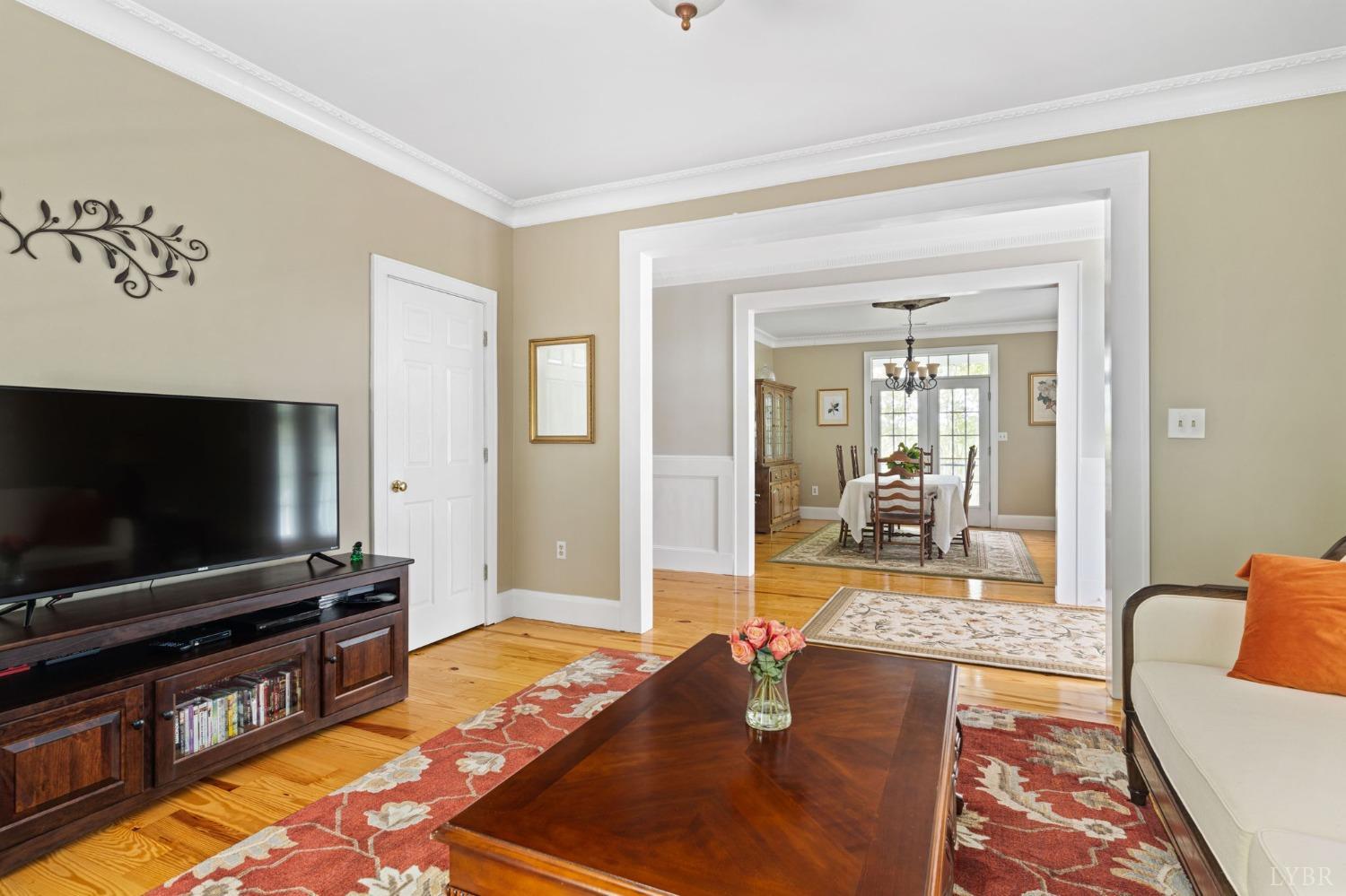 3297 Midway Road Phenix, VA 23959 - Photo 27 of 89 a living room with a flat screen tv and a rug