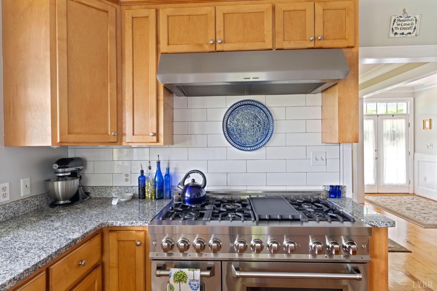 3297 Midway Road Phenix, VA 23959 - Photo 30 of 89 a kitchen with a stove and a clock