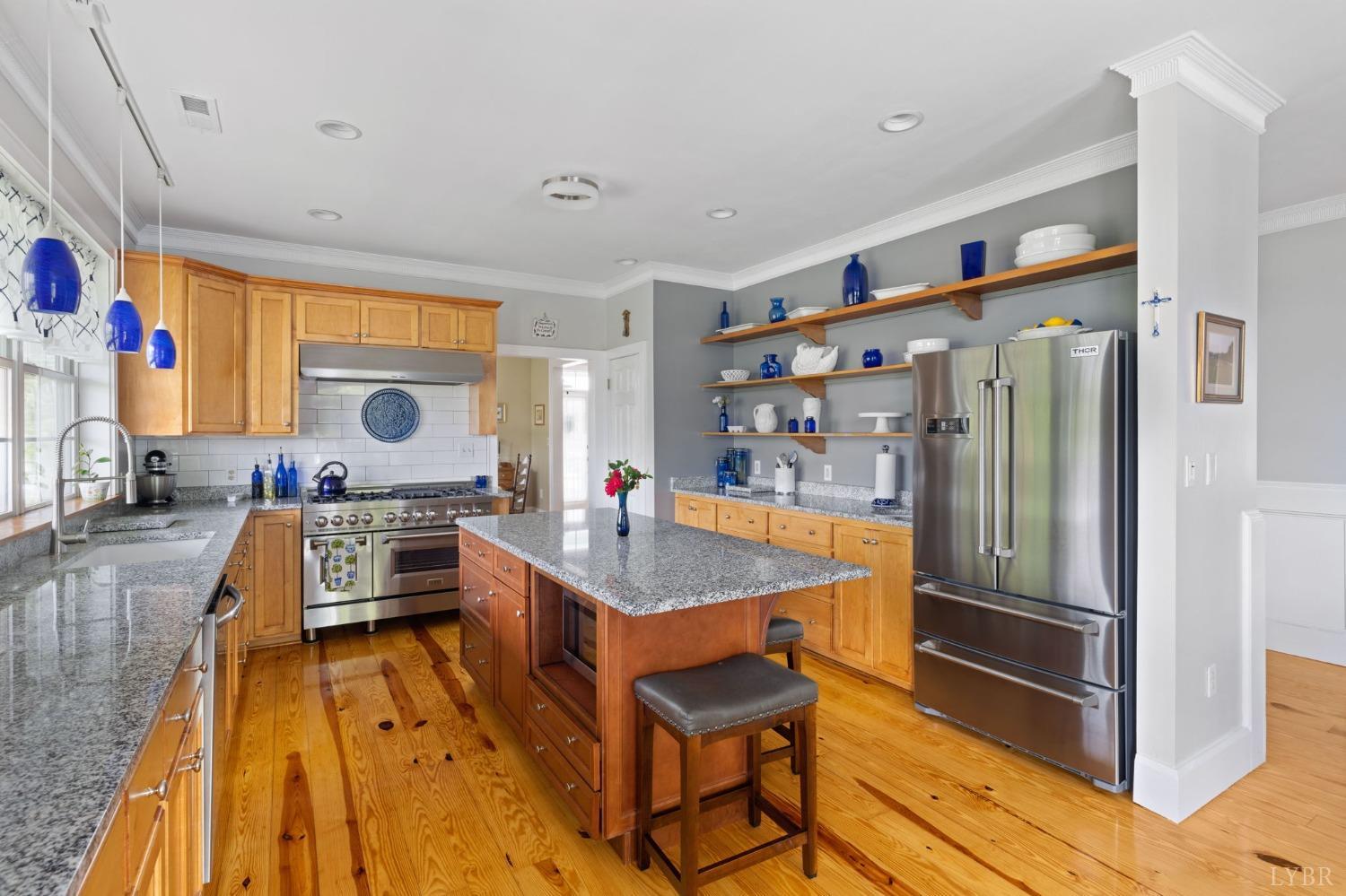 3297 Midway Road Phenix, VA 23959 - Photo 35 of 89 a living room with a couch and a table