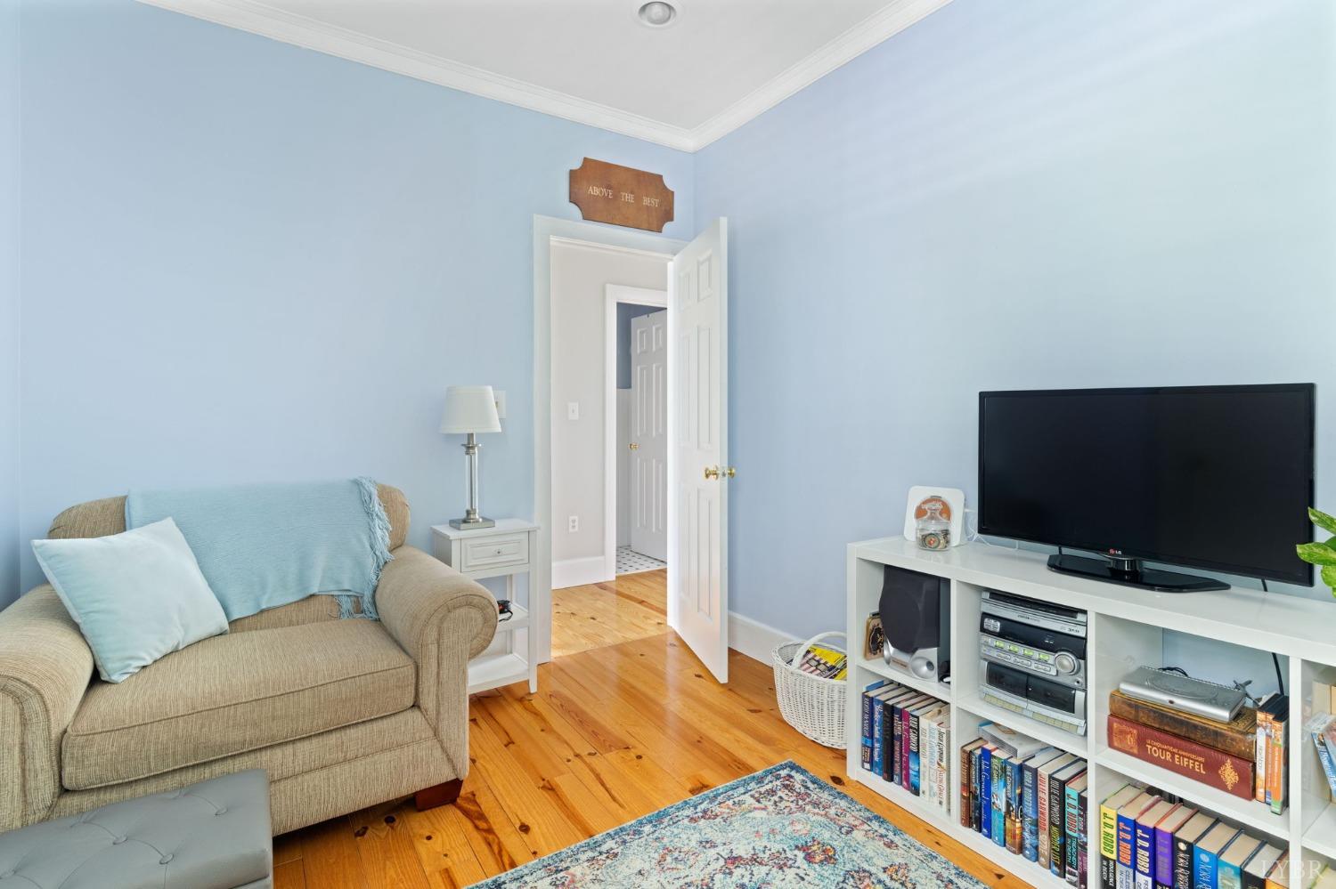 3297 Midway Road Phenix, VA 23959 - Photo 44 of 89 a living room with a flat screen tv and a couch