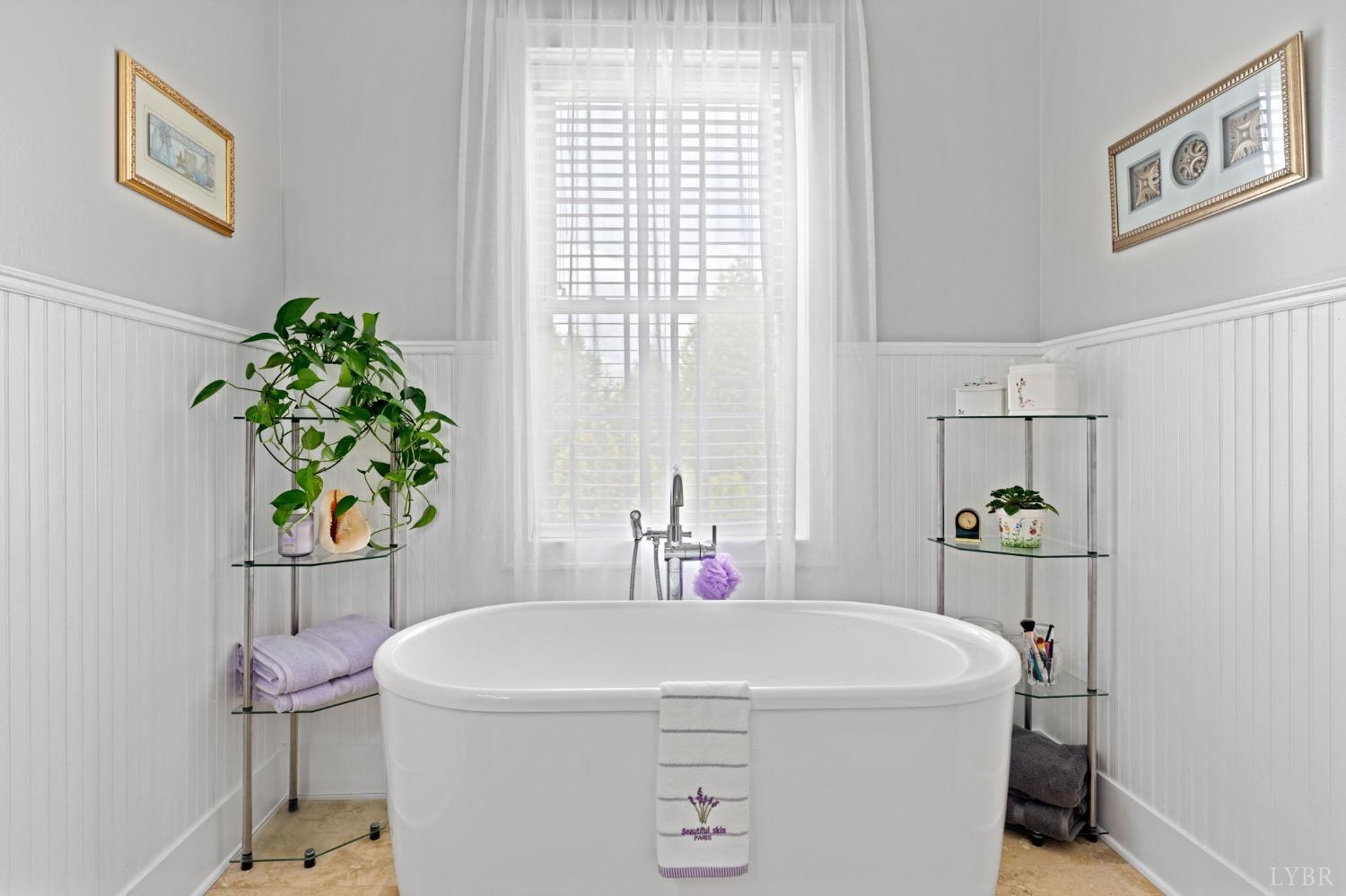 3297 Midway Road Phenix, VA 23959 - Photo 49 of 89 a white bath tub sitting next to a bathroom