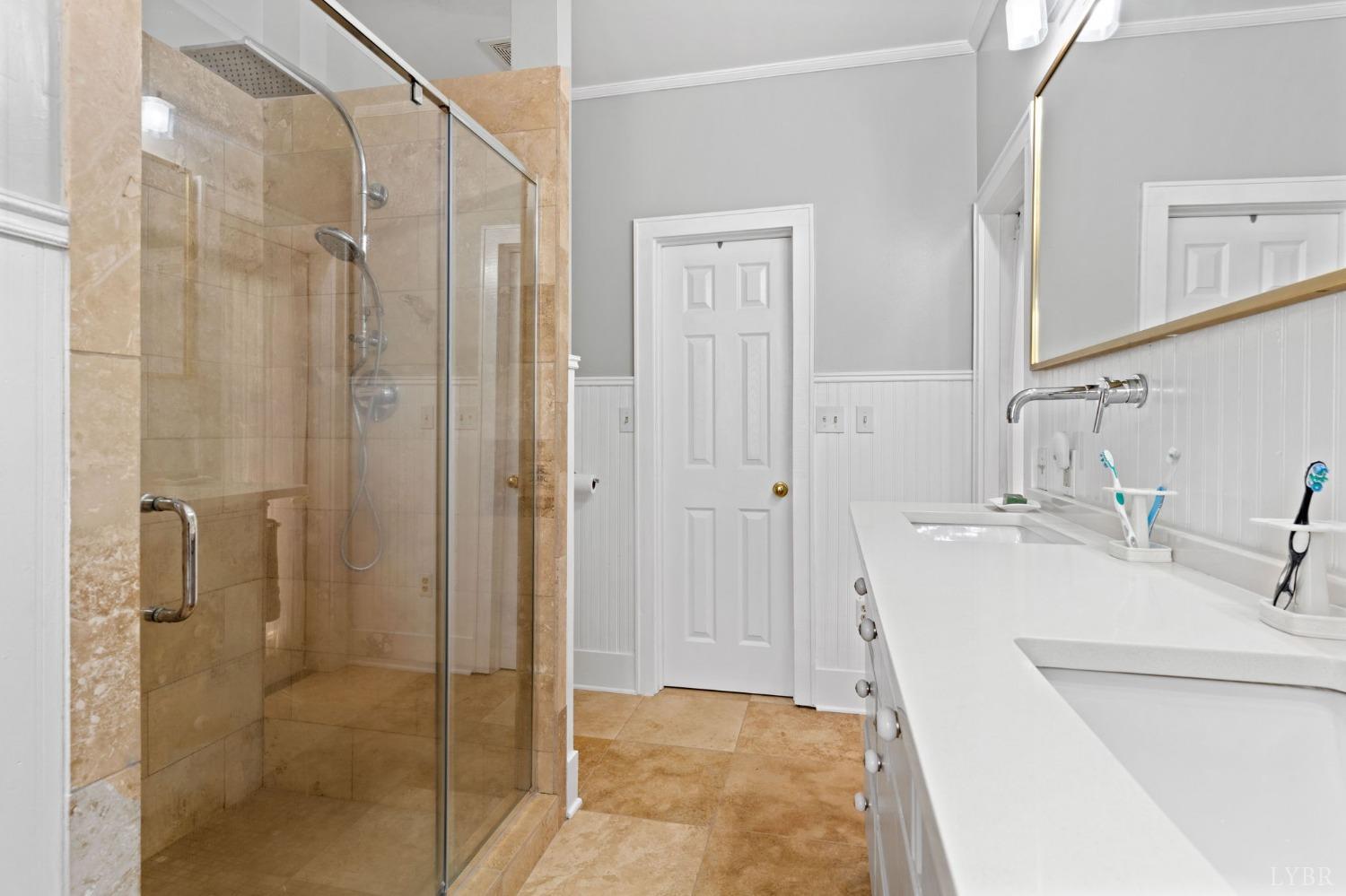 3297 Midway Road Phenix, VA 23959 - Photo 50 of 89 a bathroom with a sink a shower and a mirror