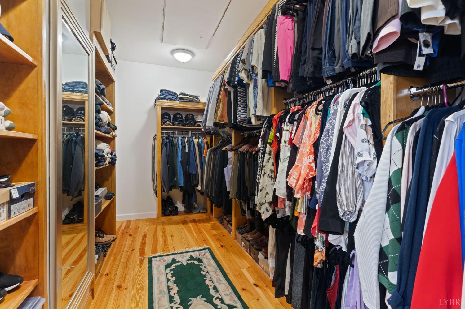 3297 Midway Road Phenix, VA 23959 - Photo 53 of 89 a view of walk in closet with clothes and shoes