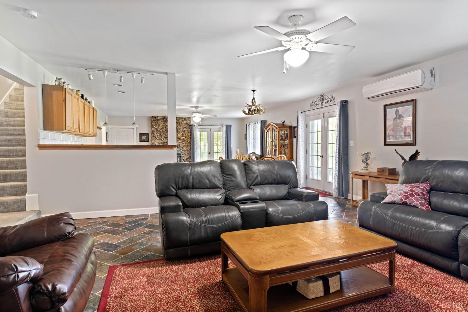 3297 Midway Road Phenix, VA 23959 - Photo 56 of 89 a living room with furniture and kitchen view