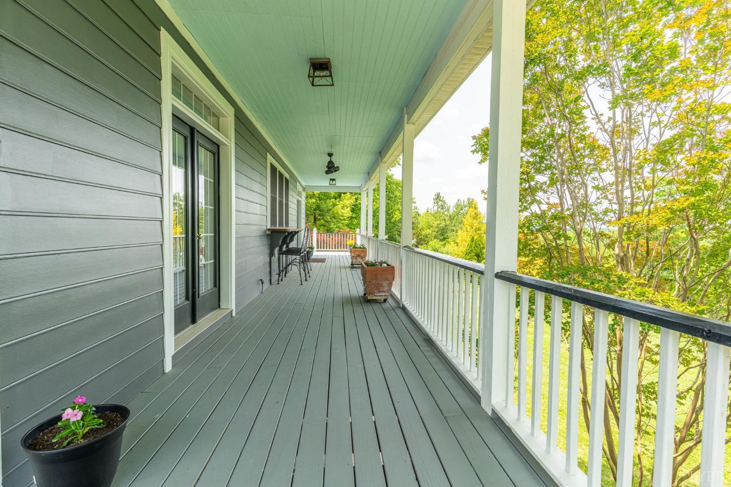 3297 Midway Road Phenix, VA 23959 - Photo 7 of 89 a view of a balcony with wooden floor