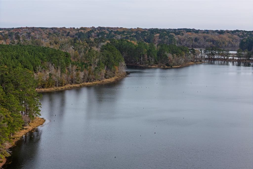 0 County Road 1211 Center, TX 75935 - Photo 5 of 38 an aerial view of residential house with outdoor space and river