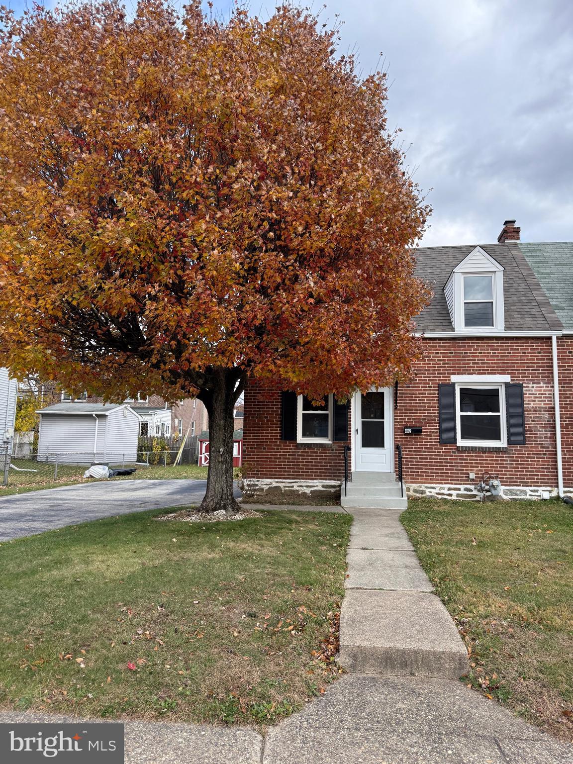 a front view of house with yard