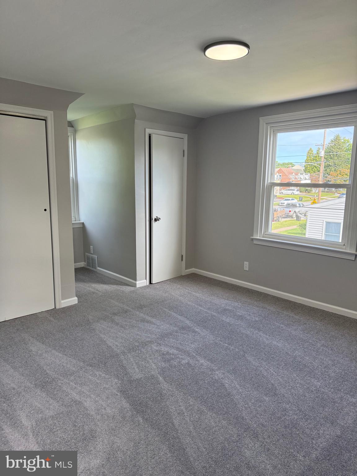 802 Fairview Road Swarthmore, PA 19081 - Photo 11 of 18 a view of an empty room with a window