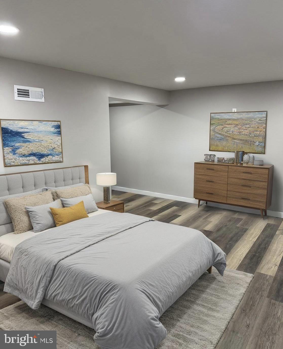 802 Fairview Road Swarthmore, PA 19081 - Photo 14 of 18 a bedroom with a bed and painting on the wall