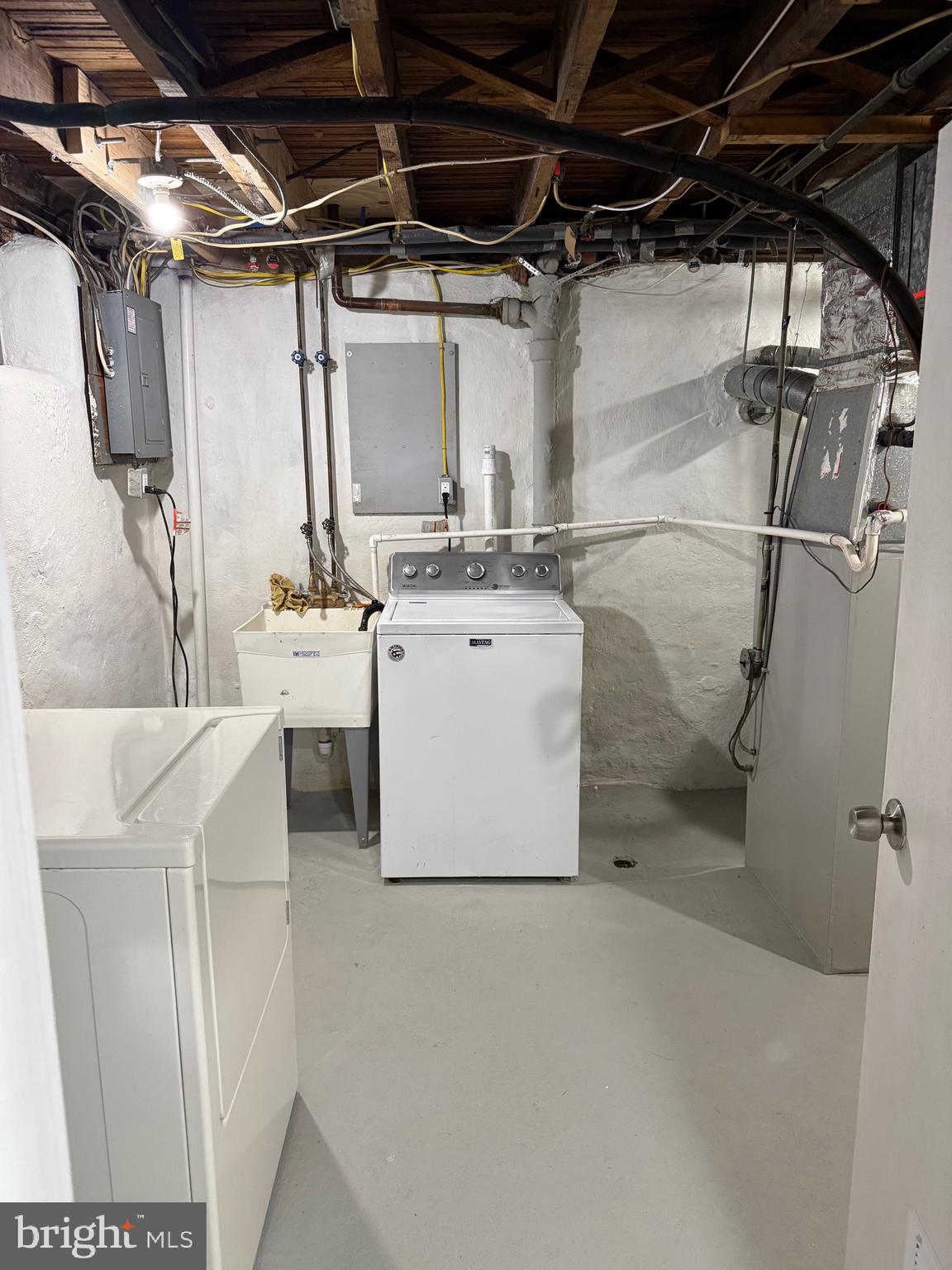 802 Fairview Road Swarthmore, PA 19081 - Photo 18 of 18 a utility room with dryer and washer
