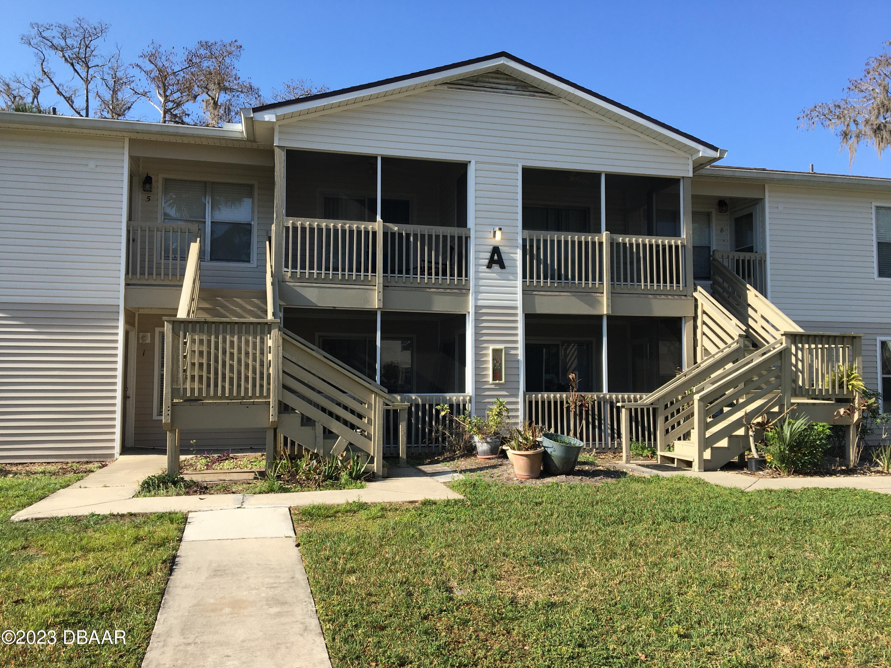 1600 Big Tree Road, Unit A7 South Daytona, FL 32119 - Photo 1 of 5 a house view with a garden space