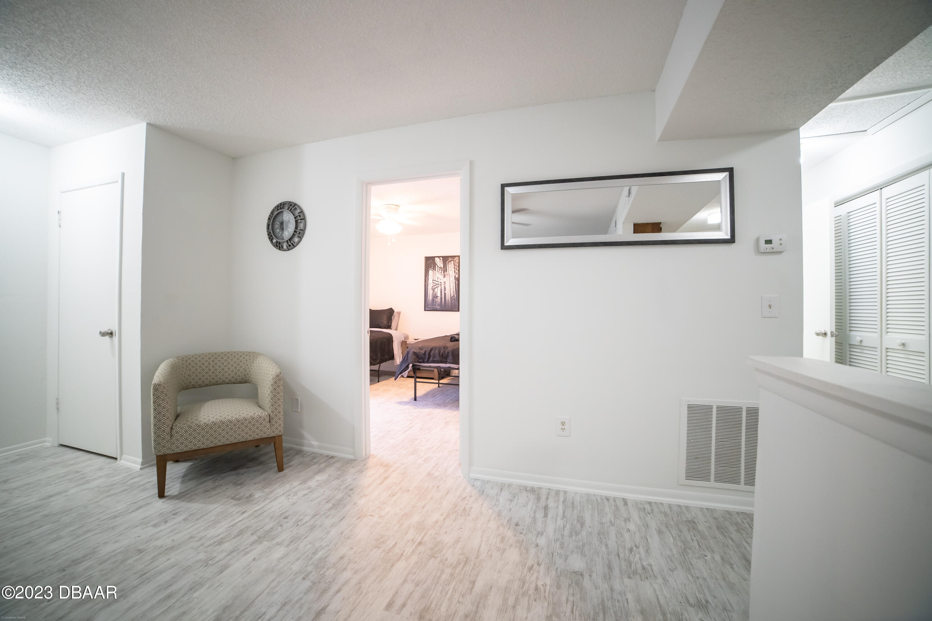 1600 Big Tree Road, Unit A7 South Daytona, FL 32119 - Photo 2 of 5 a room with furniture and a window