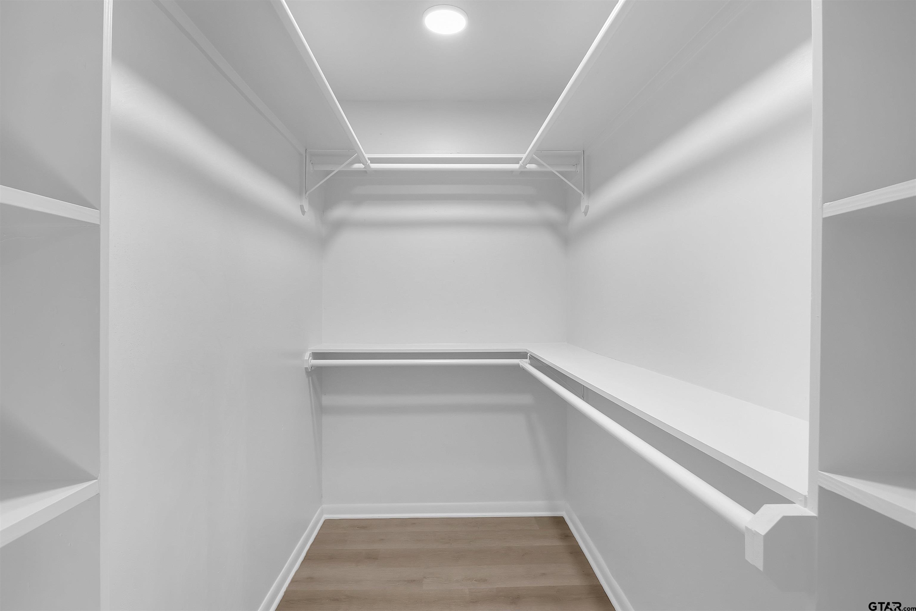 1310 Ridgeview Drive Tyler, TX 75701 - Photo 19 of 30 a view of an empty walk in closet