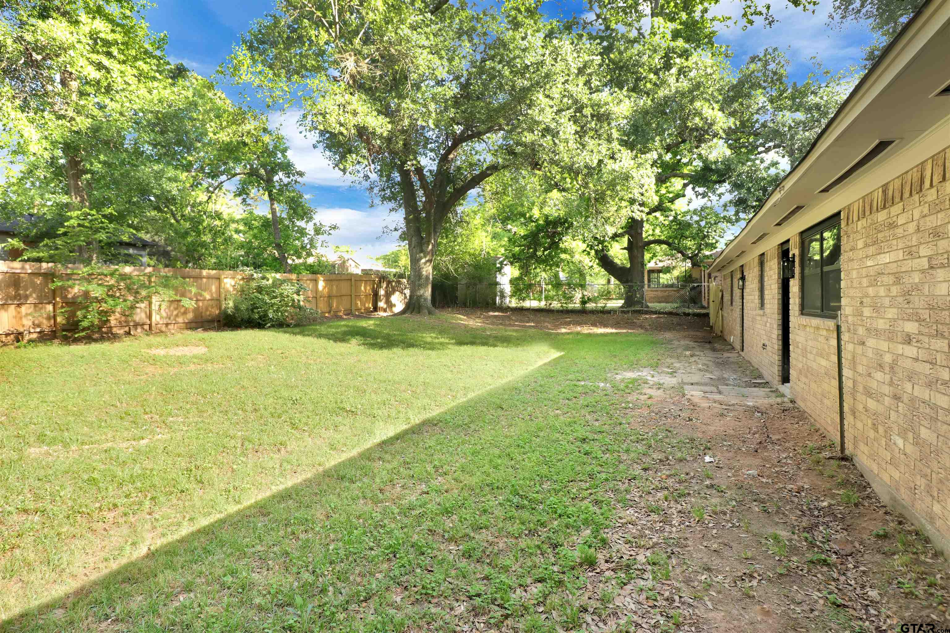 1310 Ridgeview Drive Tyler, TX 75701 - Photo 27 of 30 a view of a yard with an outdoor space