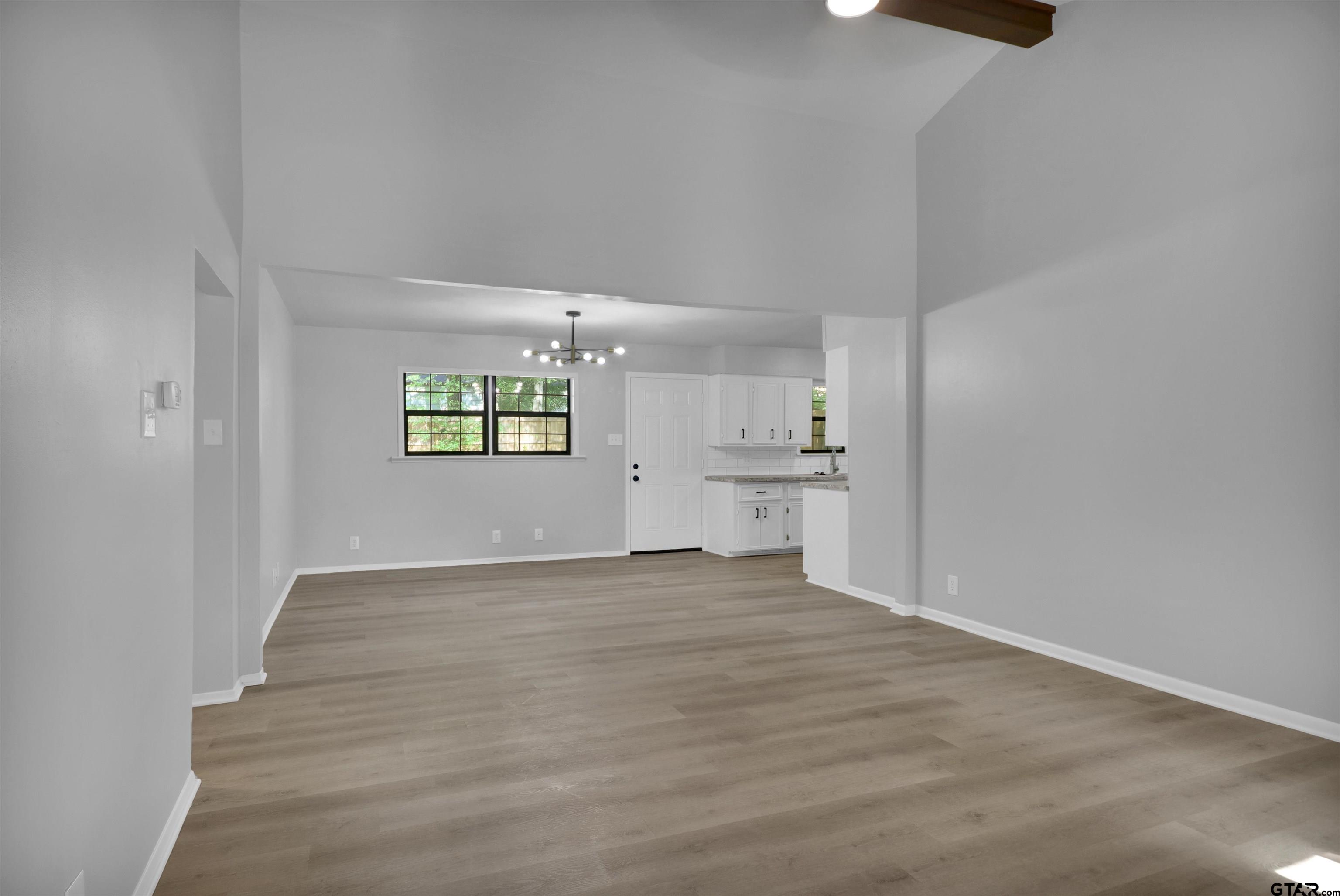 1310 Ridgeview Drive Tyler, TX 75701 - Photo 5 of 30 a view of an empty room and window