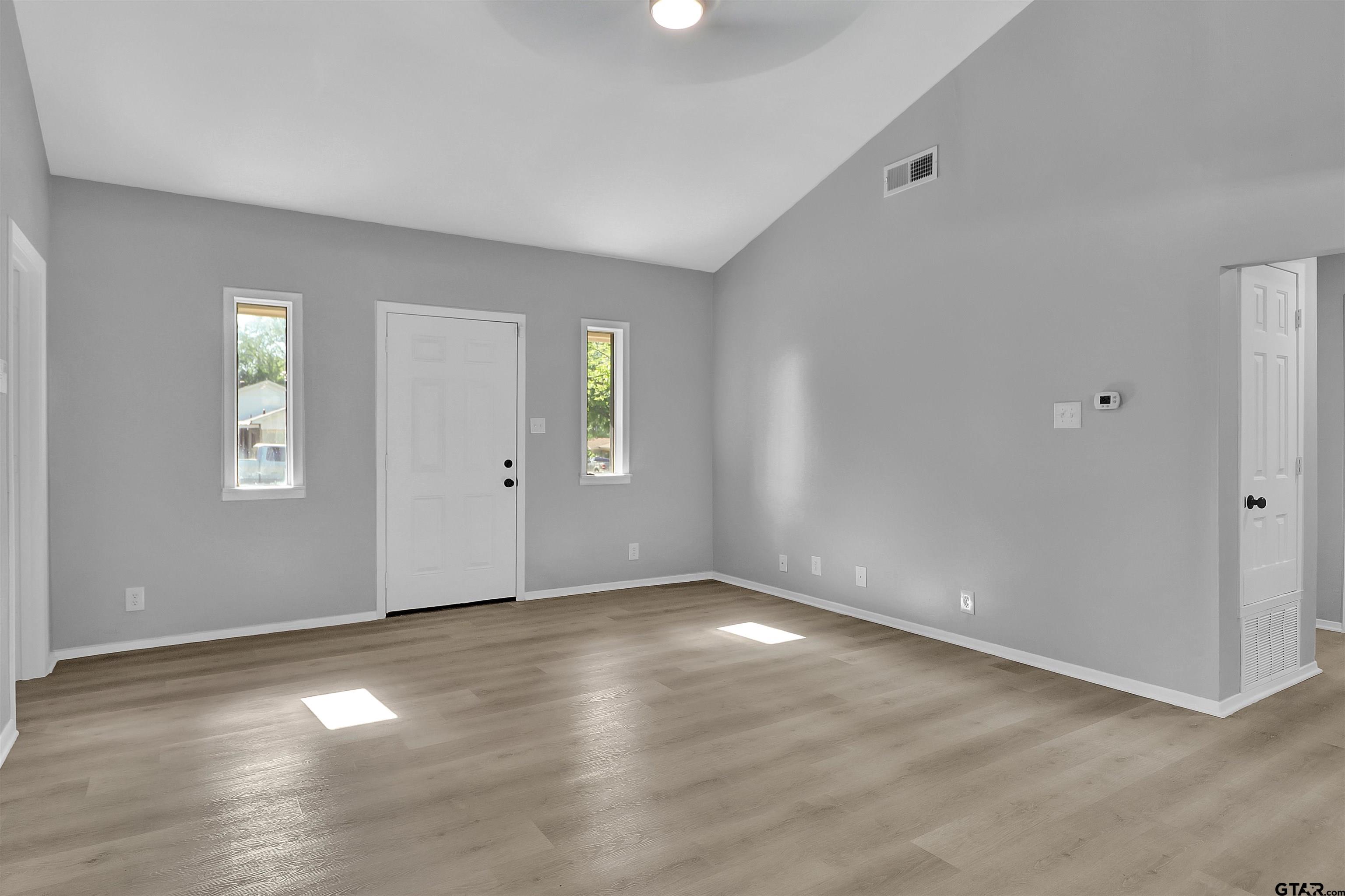 1310 Ridgeview Drive Tyler, TX 75701 - Photo 7 of 30 an empty room with windows and closet