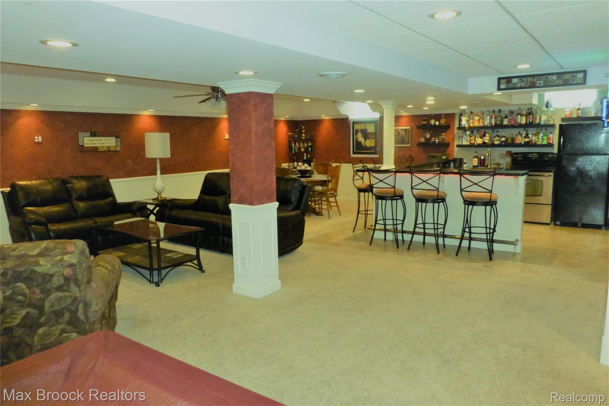 2767 York Road Rochester, MI 48309 - Photo 10 of 19 "OVER THE TOP" FINISHED BASEMENT WITH WET BAR AND MINI KITCHEN