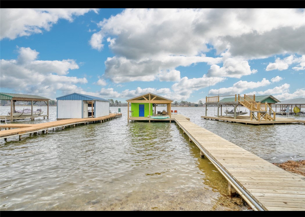 10967 Clyde Acord Road Franklin, TX 77856 - Photo 41 of 50 View of dock featuring a water view