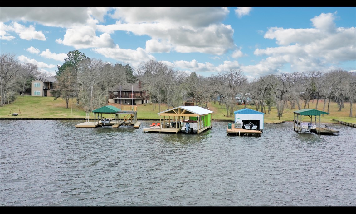 10967 Clyde Acord Road Franklin, TX 77856 - Photo 47 of 50 Water view with a dock