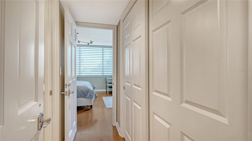 775 Longboat Club Road, Unit 204 Longboat Key, FL 34228 - Photo 18 of 40 a view of a bathroom from a hallway
