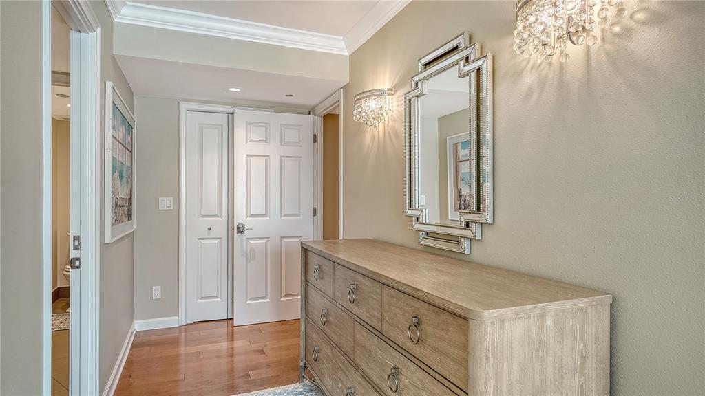 775 Longboat Club Road, Unit 204 Longboat Key, FL 34228 - Photo 19 of 40 a bathroom with a granite countertop sink and a mirror