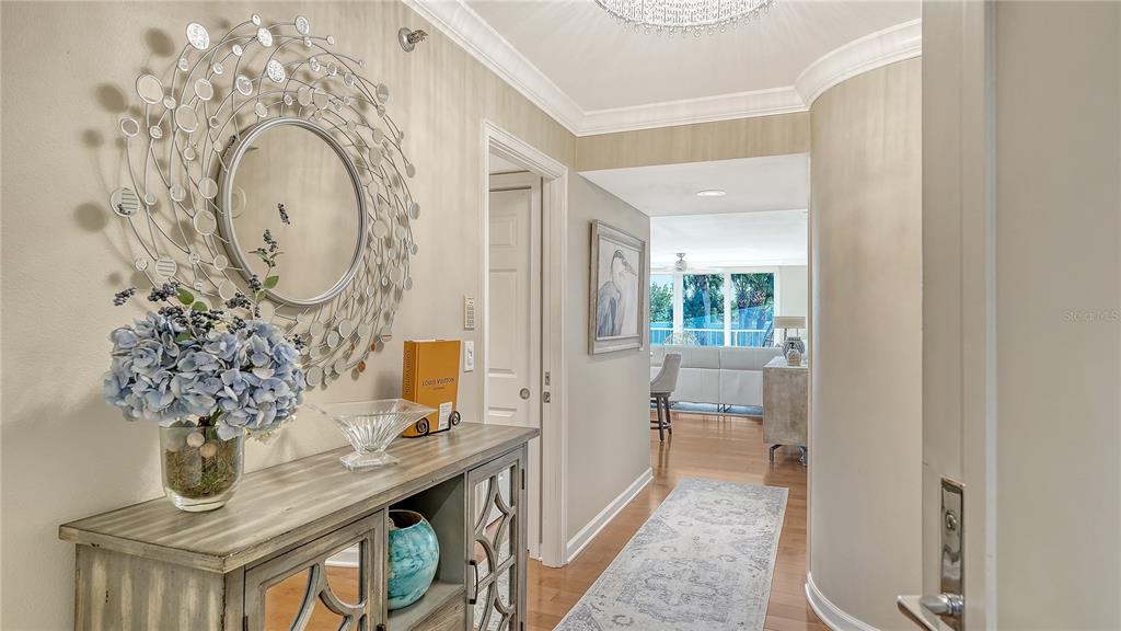 775 Longboat Club Road, Unit 204 Longboat Key, FL 34228 - Photo 3 of 40 a very nice looking room with a large window