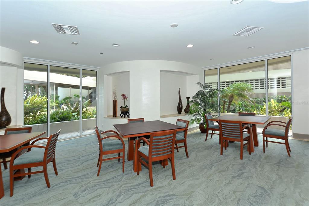 775 Longboat Club Road, Unit 204 Longboat Key, FL 34228 - Photo 32 of 40 a view of a dining room with furniture window and outside view