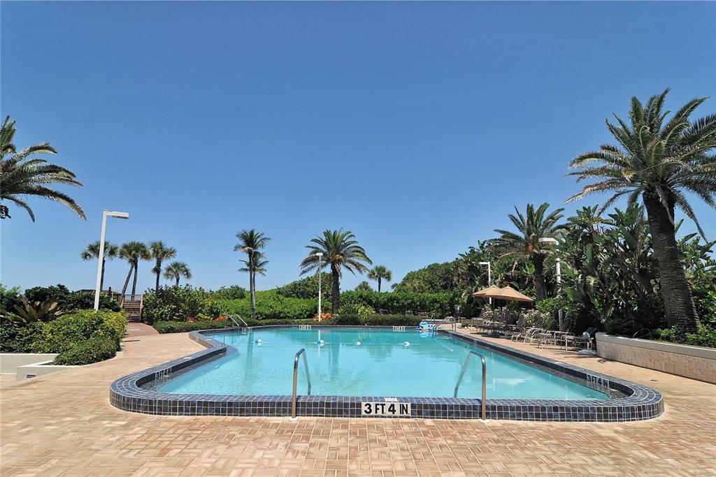 775 Longboat Club Road, Unit 204 Longboat Key, FL 34228 - Photo 34 of 40 a view of outdoor space yard and swimming pool