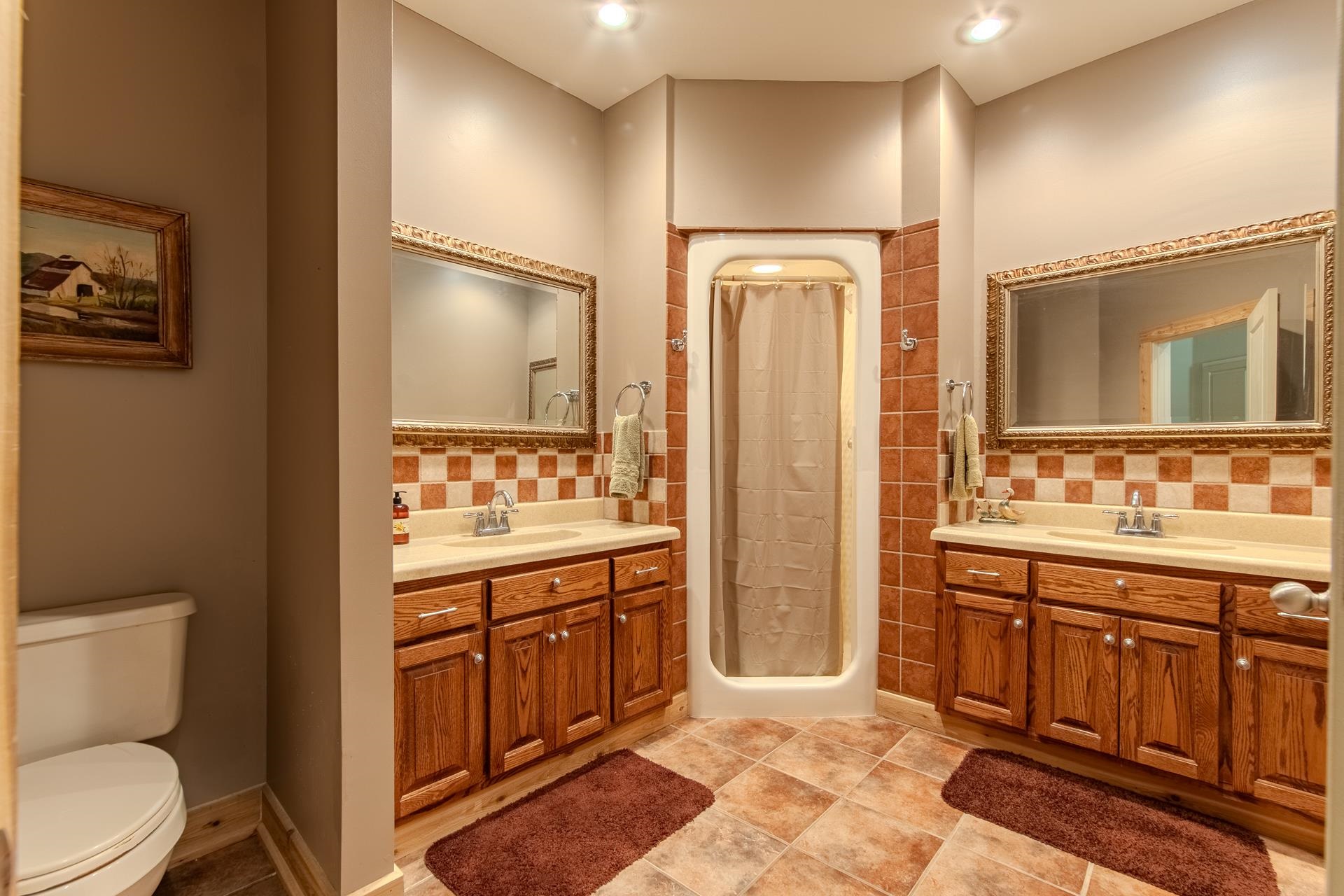 2690 Fellowship Road Sardis, TN 38371 - Photo 21 of 40 a bathroom with a toilet a sink and mirror