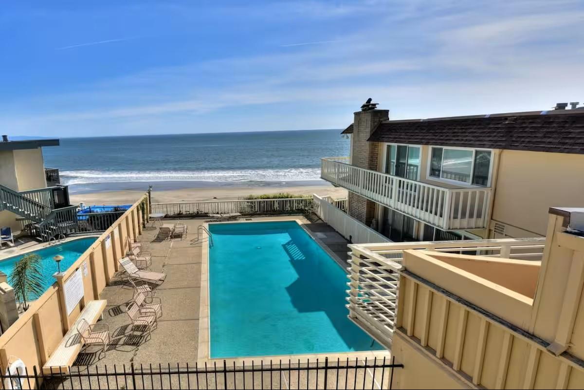 240 Rio Del Mar Boulevard, Unit O Aptos, CA 95003 - Photo 15 of 25 a view of a balcony with wooden floor and iron fence