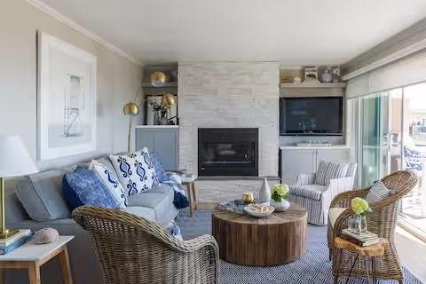 240 Rio Del Mar Boulevard, Unit O Aptos, CA 95003 - Photo 4 of 25 a living room with furniture flat screen tv and a fireplace