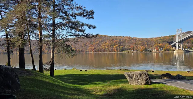 a view of a lake with a yard