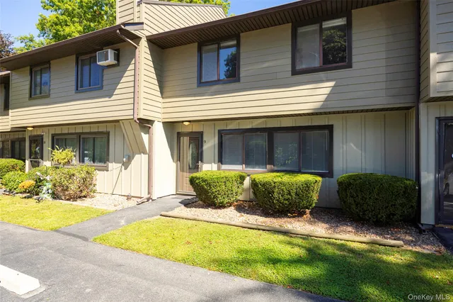 a front view of a house with swimming pool