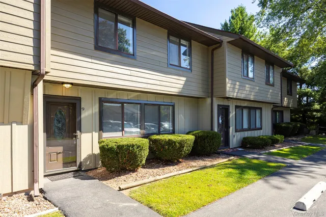 a view of a hallway with staircase